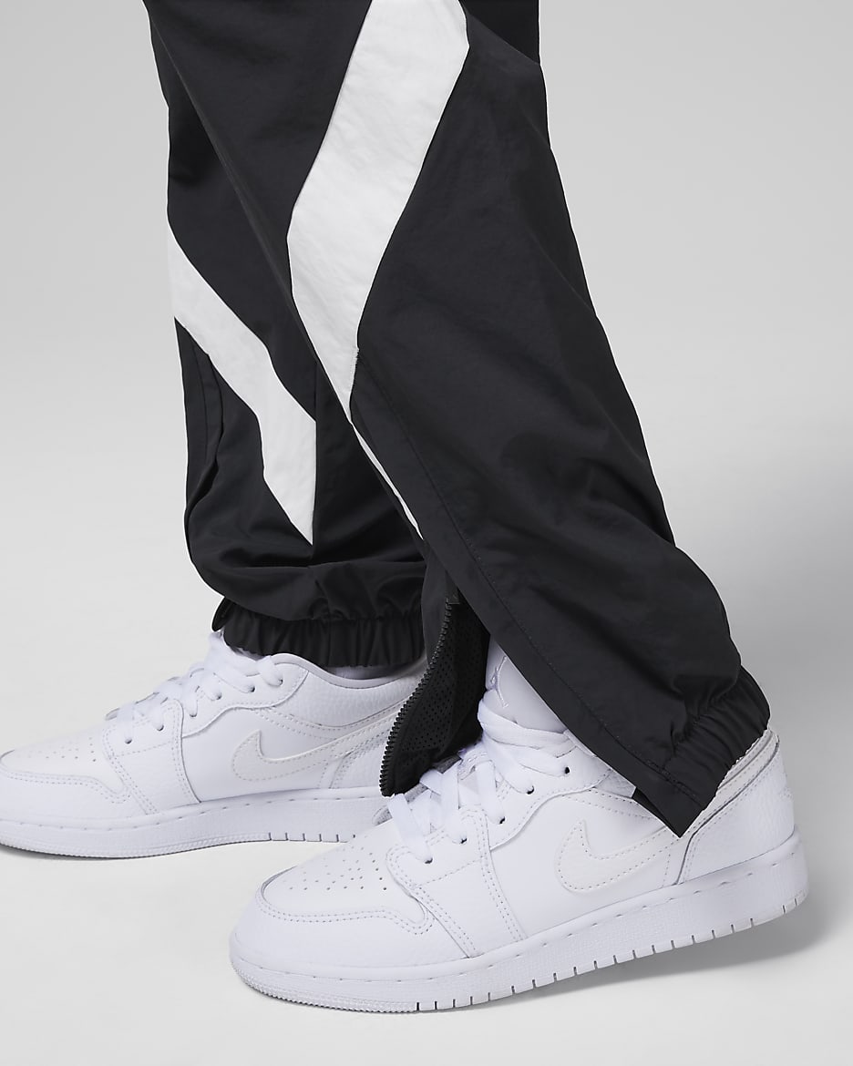 Pants de tejido Woven para ninos talla grande Jordan Paris Saint Germain. Nike